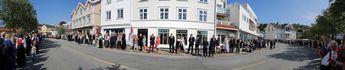 People in Grimstad waiting for the parade. May 17th, Norway's National Day
© 2014 Knut Dalen